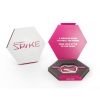 Peeksteep Spike Packing Tool, pink. Shown inside the box